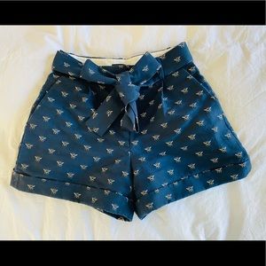 J Crew deep navy honeybee print shorts with decorative belt ties.